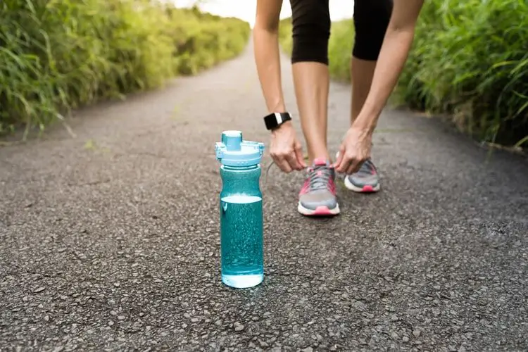 Woman exercising and electrolytes