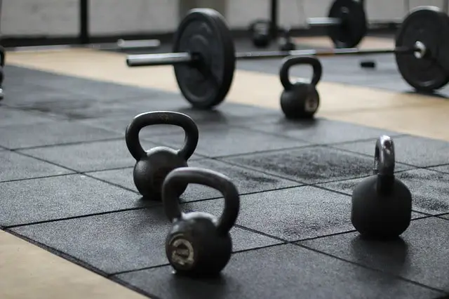 Dumbells on a gym floor.